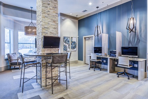 Clubhouse with modern amenities at Harlow Spring Cypress Apartments