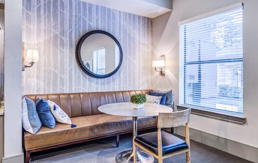 Welcoming clubhouse featuring cozy seating and modern decor at Harlow Spring Cypress Apartments
