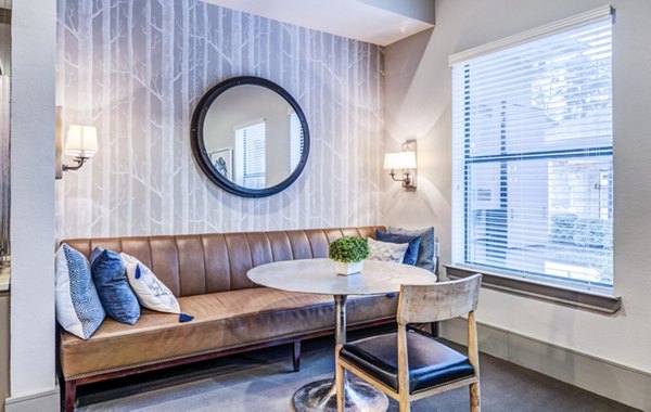 Welcoming clubhouse featuring cozy seating and modern decor at Harlow Spring Cypress Apartments