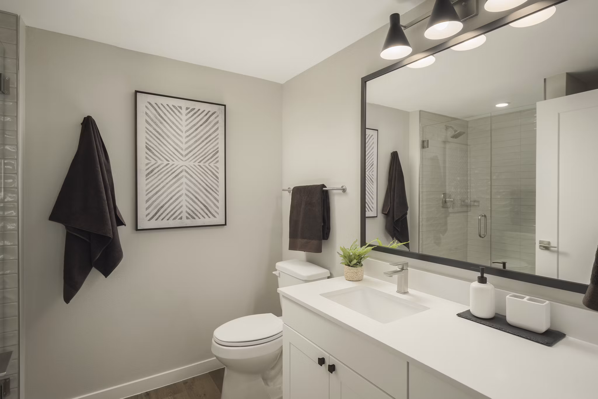 Contemporary bathroom with sleek fixtures at Smith + Rio Apartments