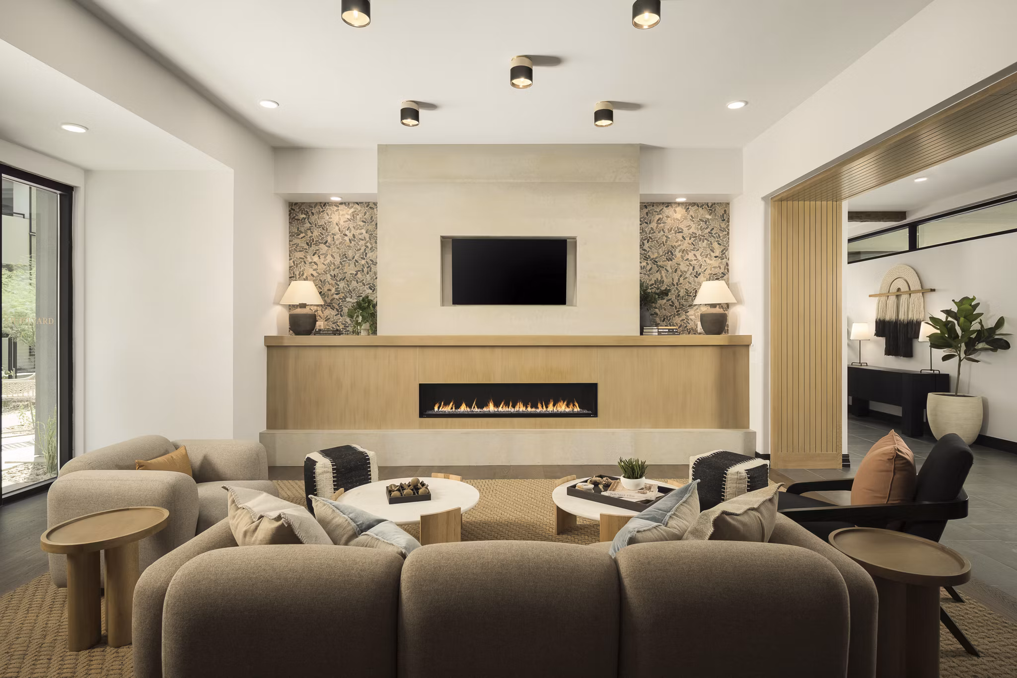 Elegant clubhouse with modern decor at Smith + Rio Apartments, offering luxury amenities for residents to enjoy in style