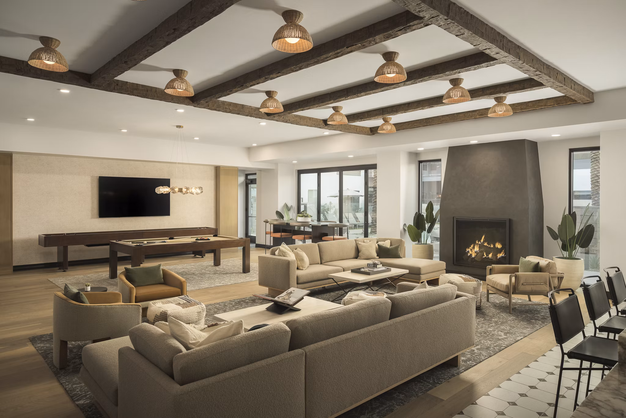 Clubhouse featuring modern design and lounge spaces at Smith + Rio Apartments, a Greystar luxury apartment community