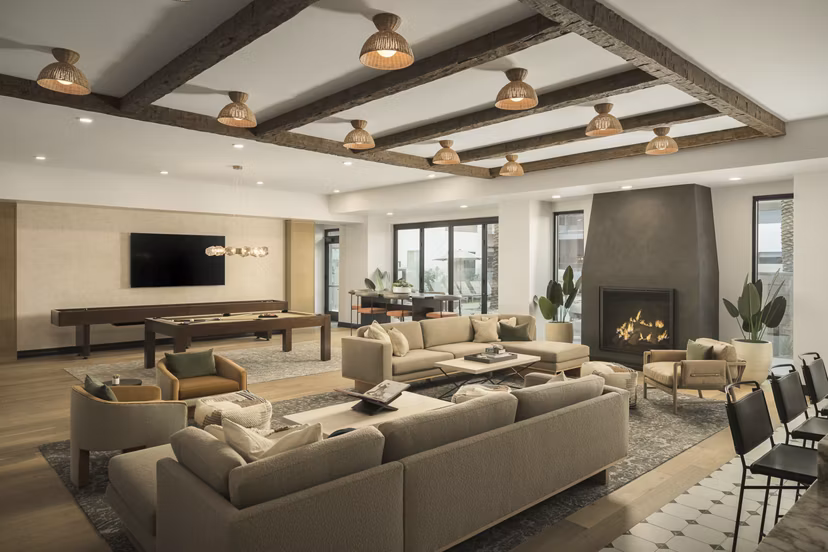 Clubhouse featuring modern design and lounge spaces at Smith + Rio Apartments, a Greystar luxury apartment community