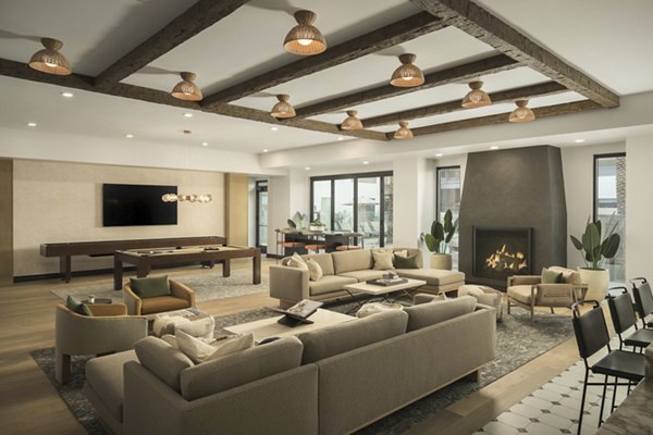 Clubhouse featuring modern design and lounge spaces at Smith + Rio Apartments, a Greystar luxury apartment community