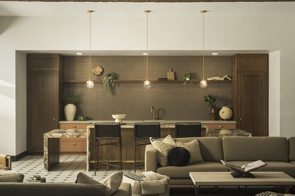 Modern clubhouse featuring sleek design and social spaces at Smith + Rio Apartments