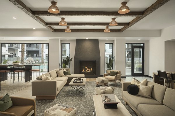 Elegant clubhouse with modern design elements at Smith + Rio Apartments, offering luxurious community spaces in a vibrant neighborhood