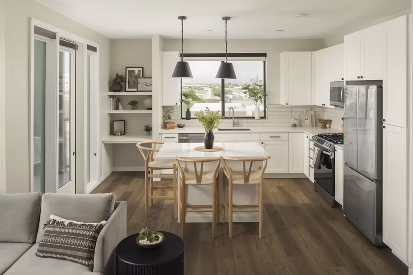 Modern kitchen with granite countertops in Smith + Rio Apartments