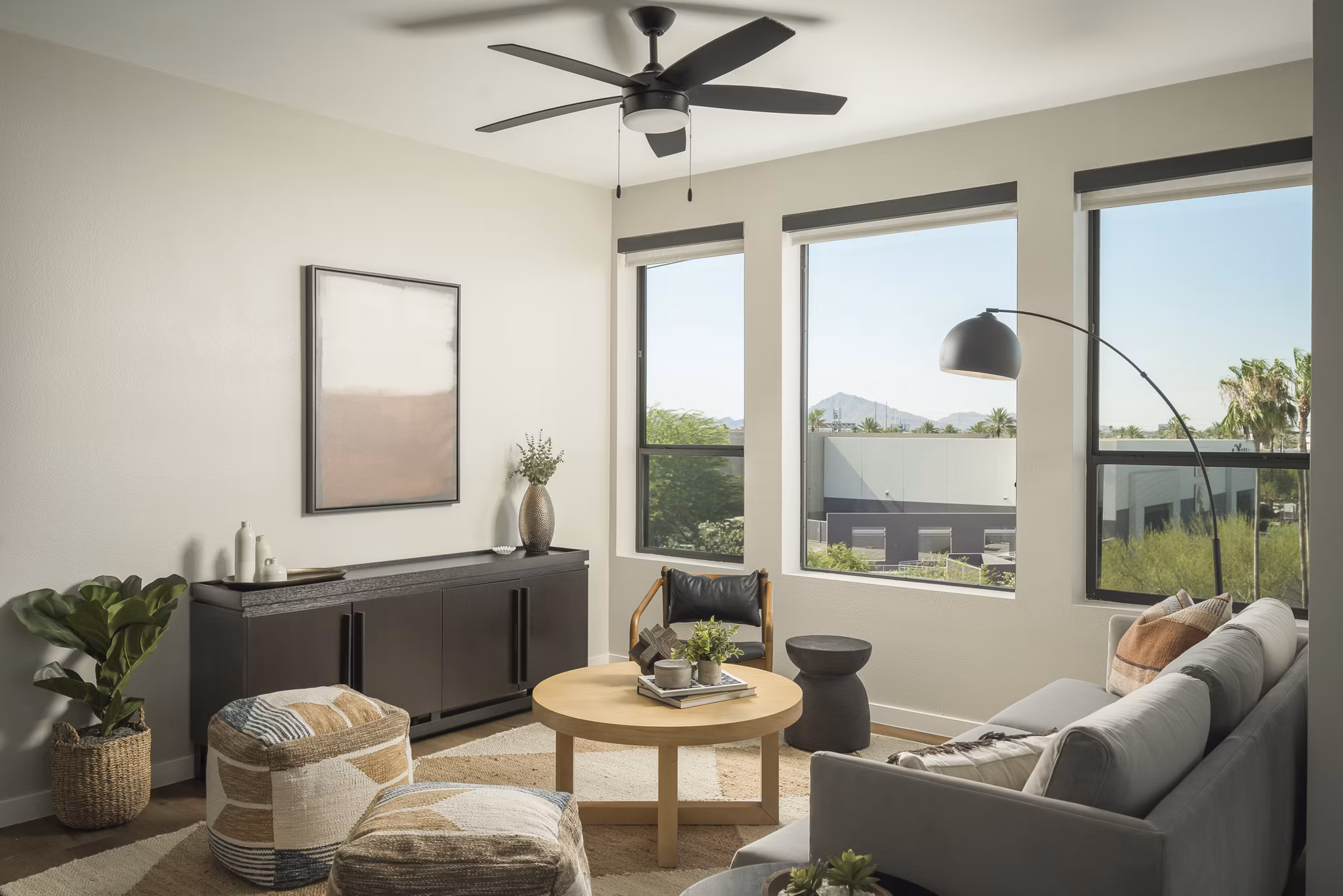 Spacious living room with modern decor at Smith + Rio Apartments