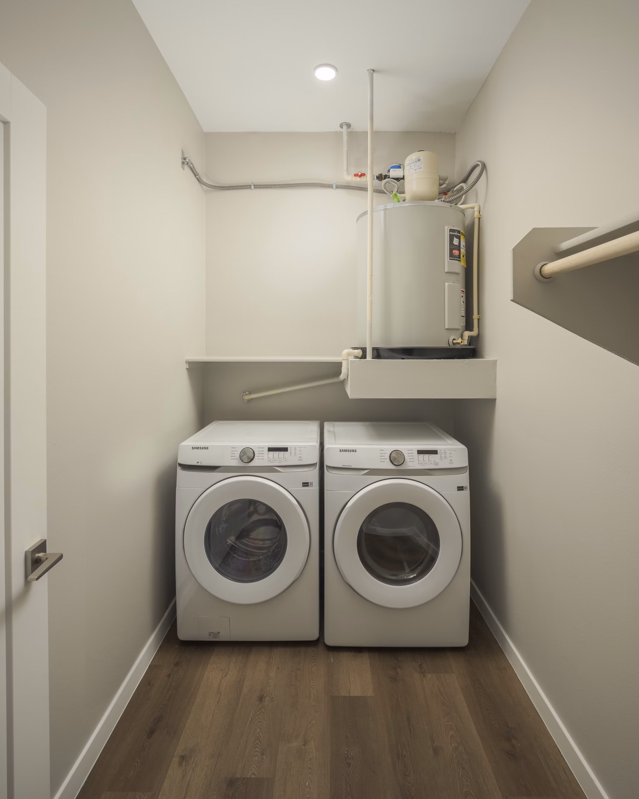 Spacious laundry room with modern appliances at Smith + Rio Apartments