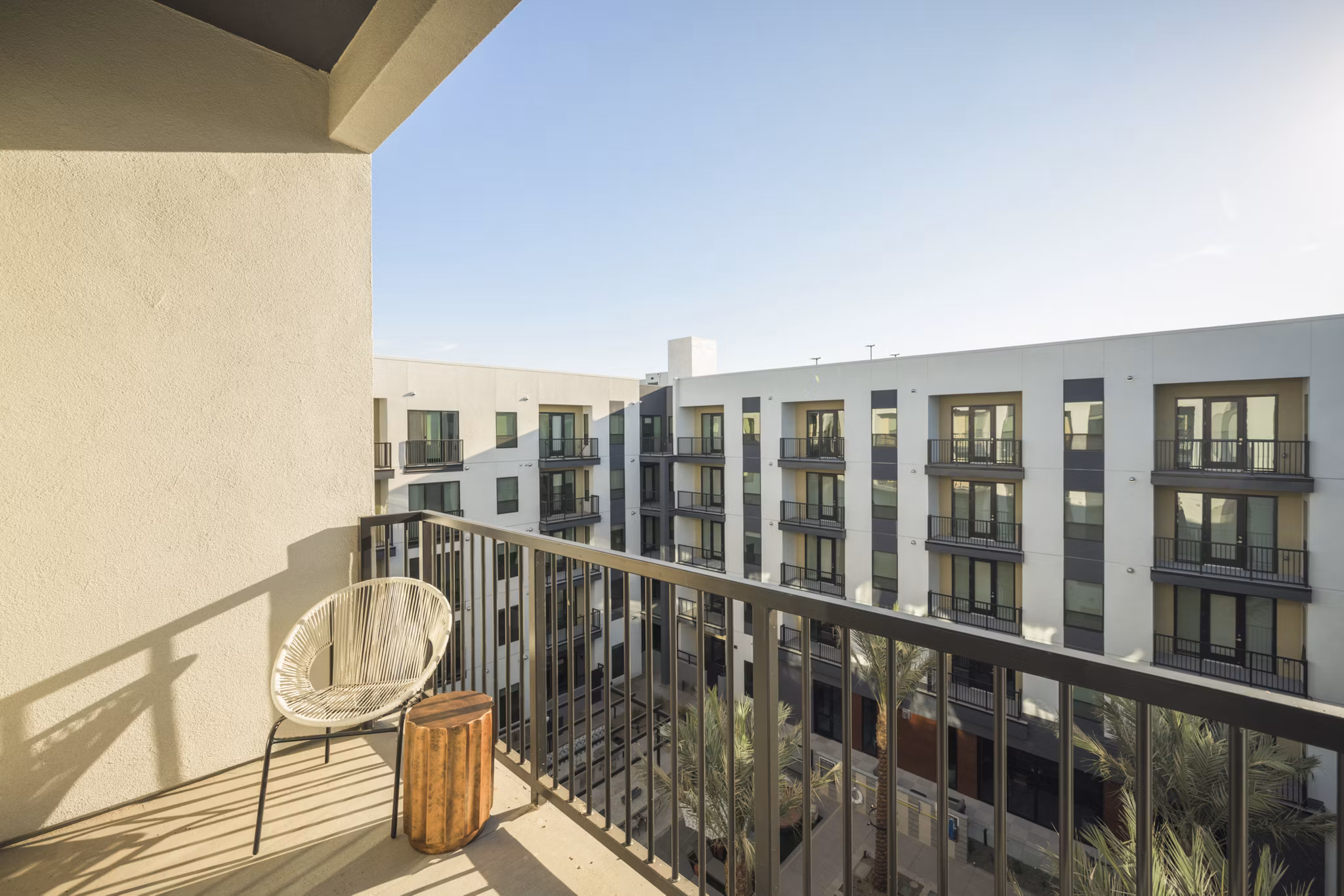Outdoor patio with modern seating at Smith + Rio Apartments, offering luxurious amenities for Greystar residents in the heart of the city