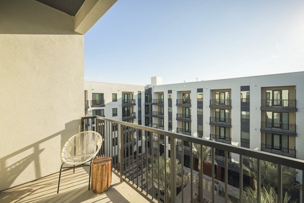 Outdoor patio with modern seating at Smith + Rio Apartments, offering luxurious amenities for Greystar residents in the heart of the city