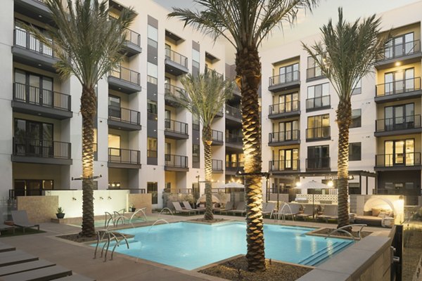 Luxury pool at Smith + Rio Apartments in downtown Phoenix, featuring sleek design and comfortable lounge areas, perfect for relaxation
