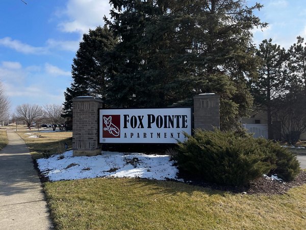 Fox Pointe: Elegant luxury apartments surrounded by lush greenery and modern architecture