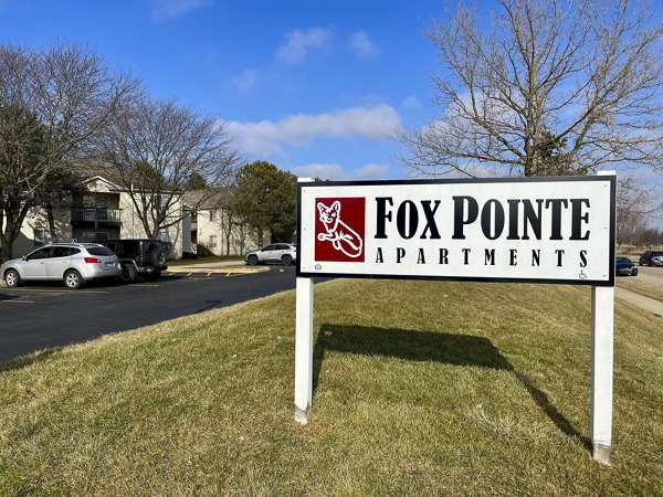 Fox Pointe: Elegant brick luxury apartments with lush landscaping