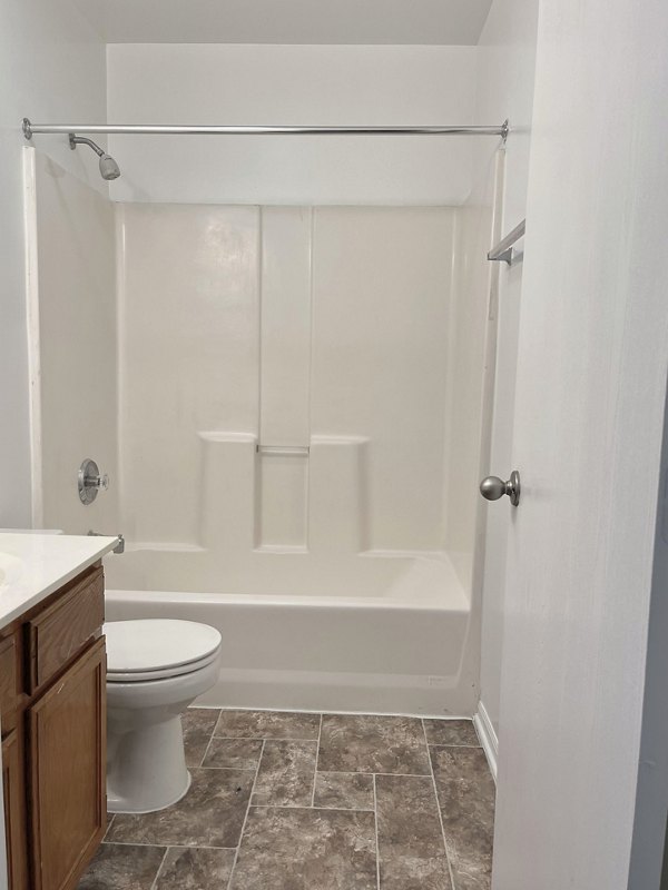 Modern bathroom with granite countertops in Fox Pointe apartments
