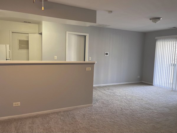 Elegant kitchen with stainless steel appliances in Fox Pointe luxury apartments