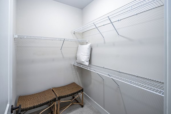 Spacious bedroom closet with ample shelving at Soundwater Apartments, ideal for organized living in luxury apartments by the waterfront