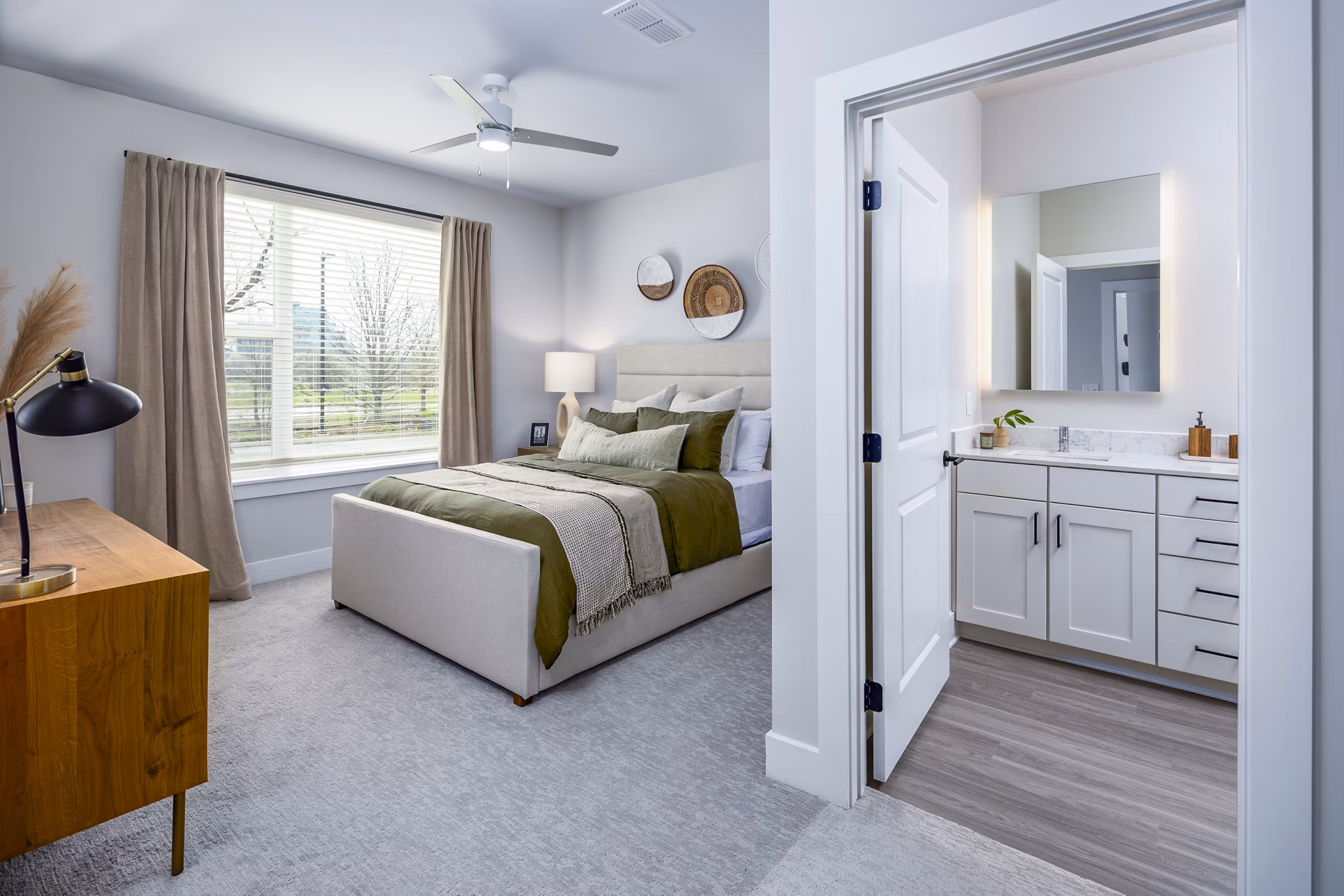 Comfortable bedroom with ocean views at Soundwater Apartments