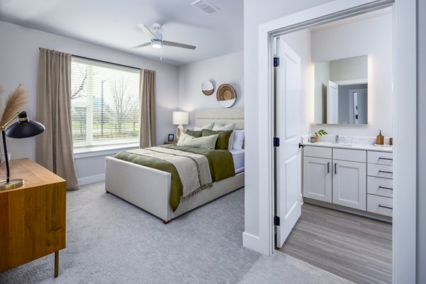 Comfortable bedroom with ocean views at Soundwater Apartments