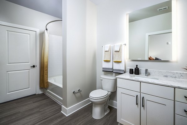 Modern bathroom with sleek fixtures at Soundwater Apartments luxury residence
