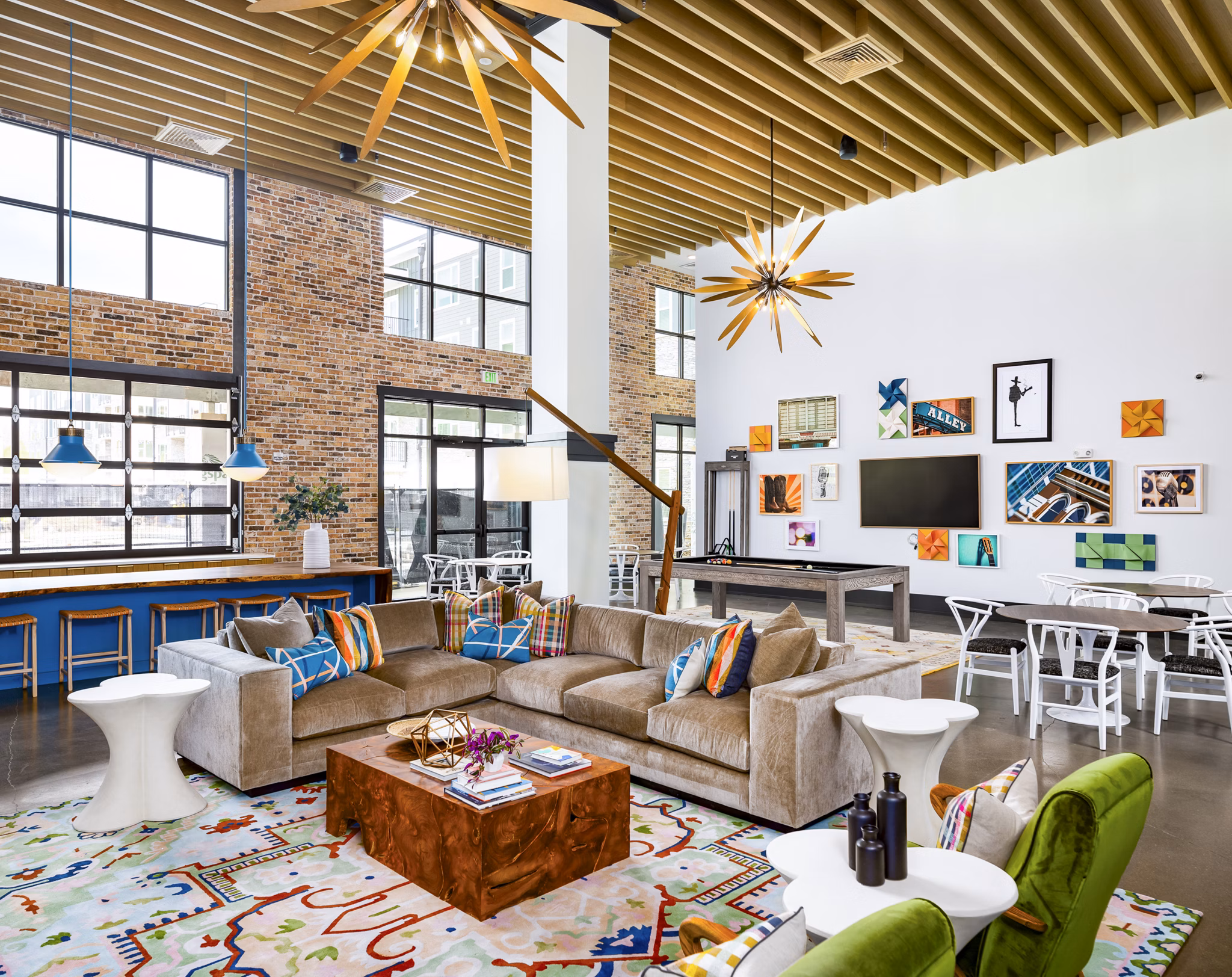 Stylish clubhouse featuring modern seating and entertainment options at Soundwater Apartments
