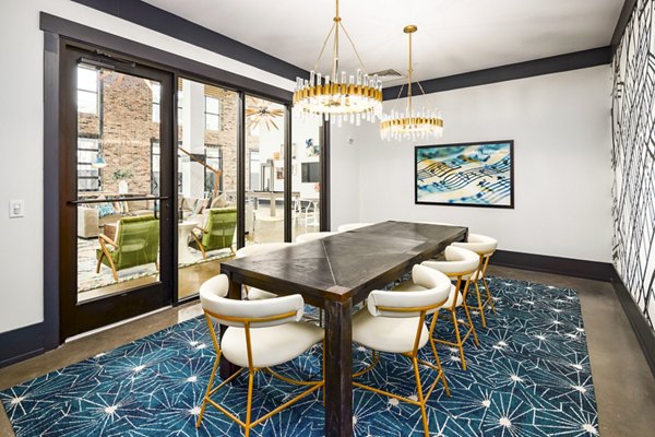 Clubhouse business center with modern workstations at Soundwater Apartments
