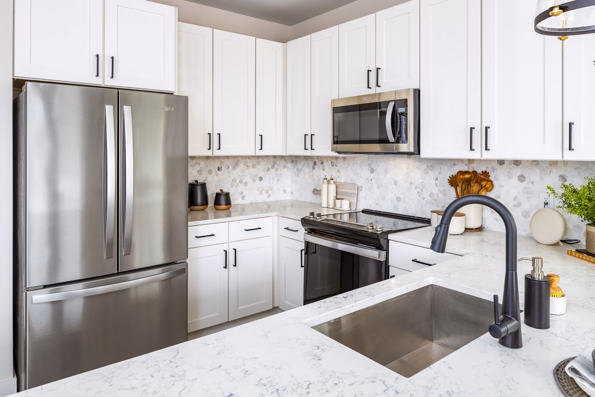 Modern kitchen with sleek finishes at Soundwater Apartments