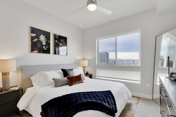 Luxury bedroom with modern decor at The Dorsey Apartments