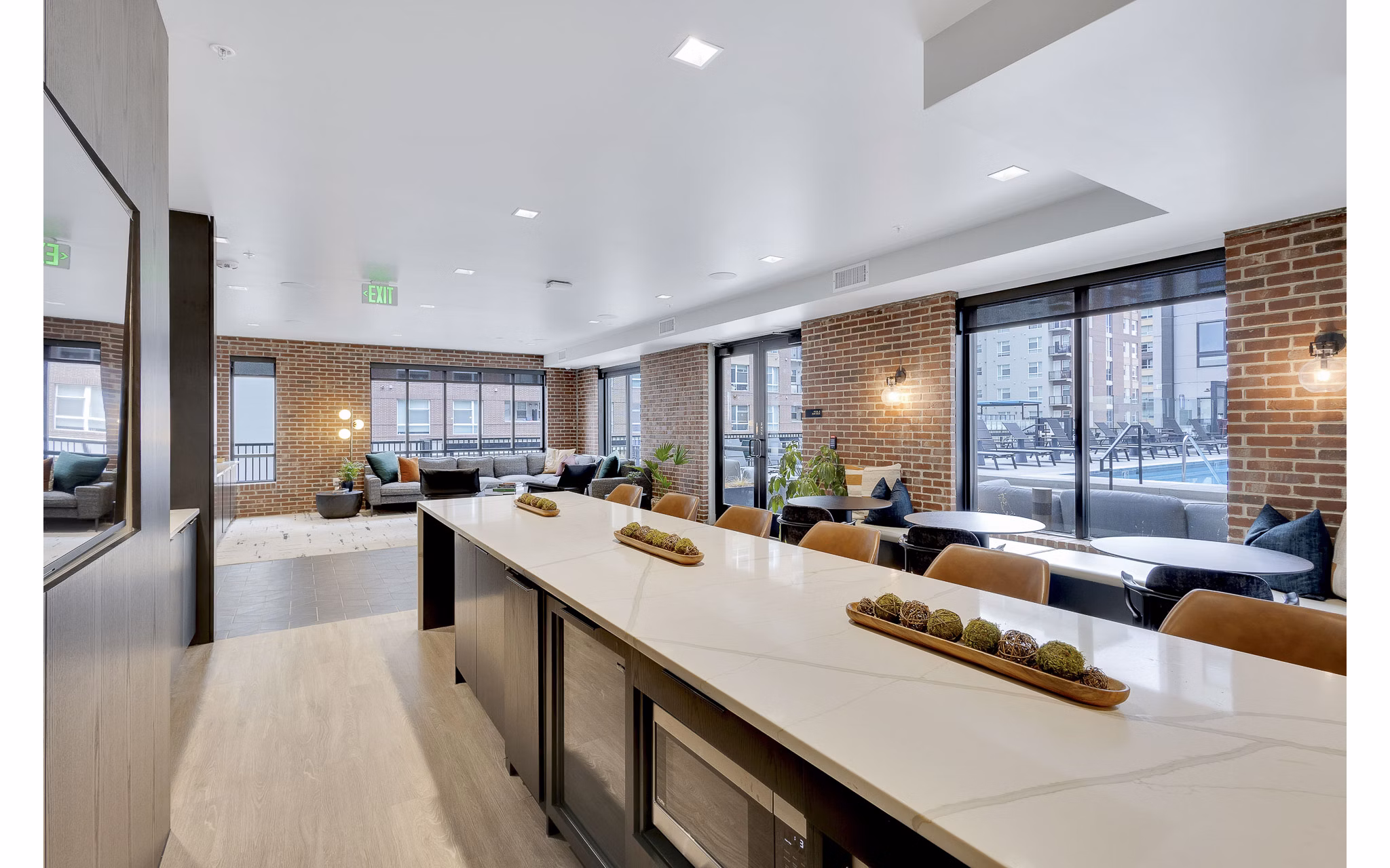 Modern clubhouse with sleek design at The Dorsey Apartments; luxury living spaces for social gatherings and relaxation