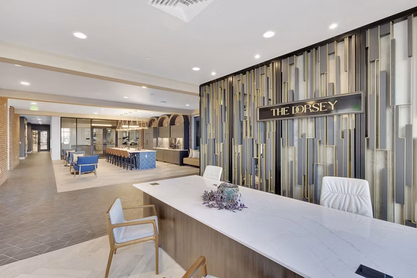 The Dorsey Apartments: Elegant clubhouse with modern decor and cozy seating areas