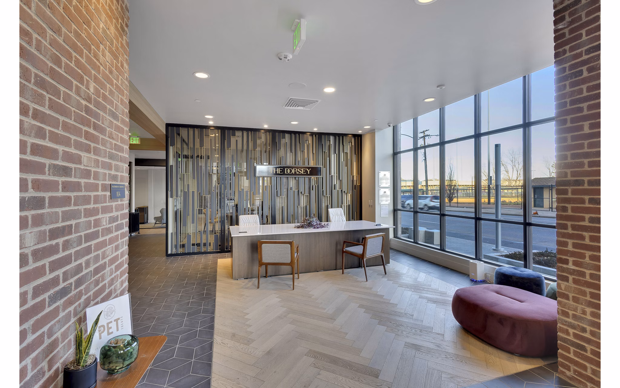 Stylish clubhouse with modern decor at The Dorsey Apartments, offering luxurious social spaces for residents