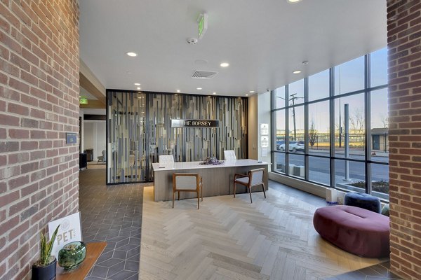 Stylish clubhouse with modern decor at The Dorsey Apartments, offering luxurious social spaces for residents