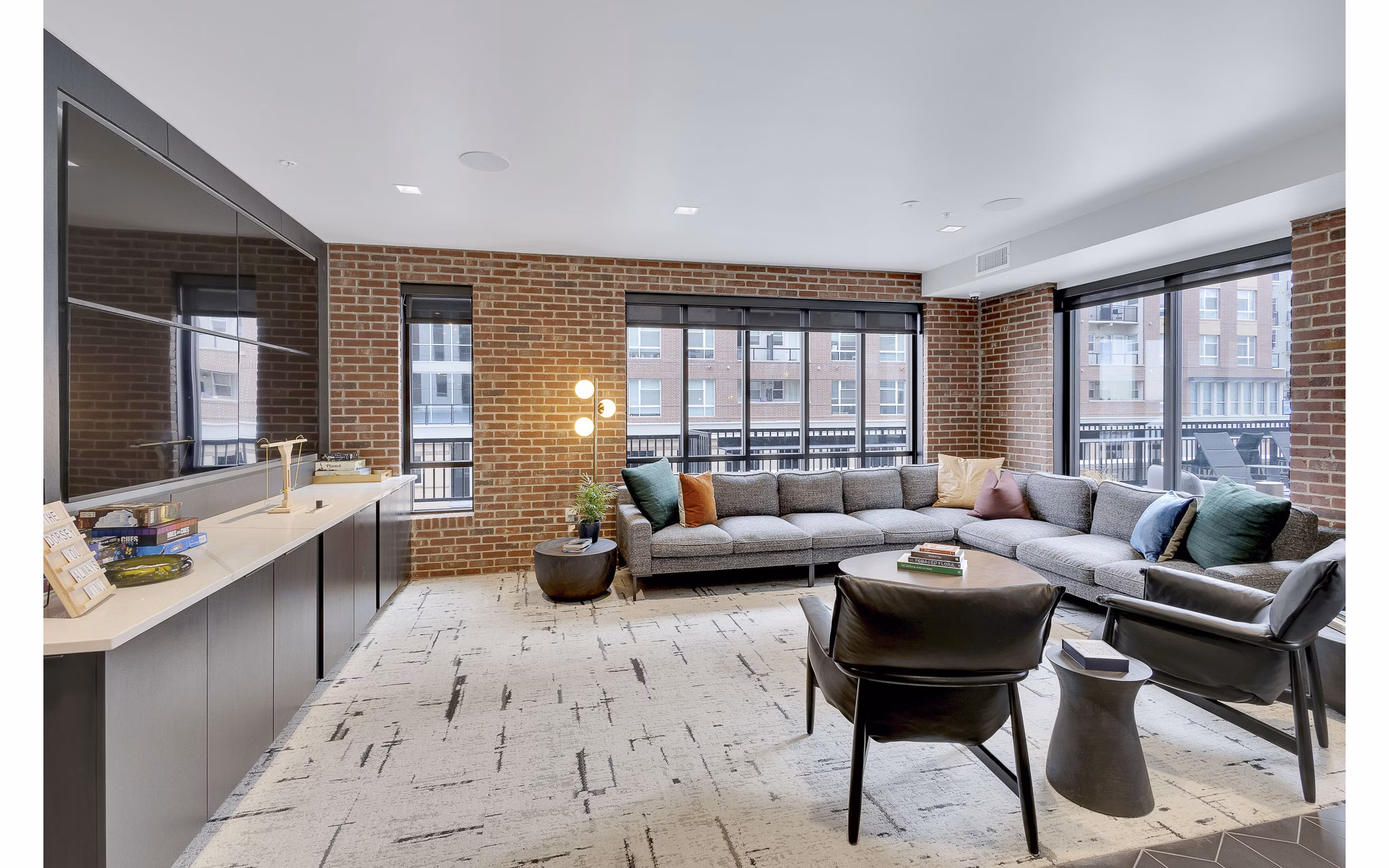 Elegant clubhouse with modern decor at The Dorsey Apartments, ideal for luxury living and community gatherings