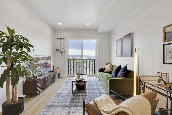 Clubhouse with modern design and cozy seating areas at The Dorsey Apartments