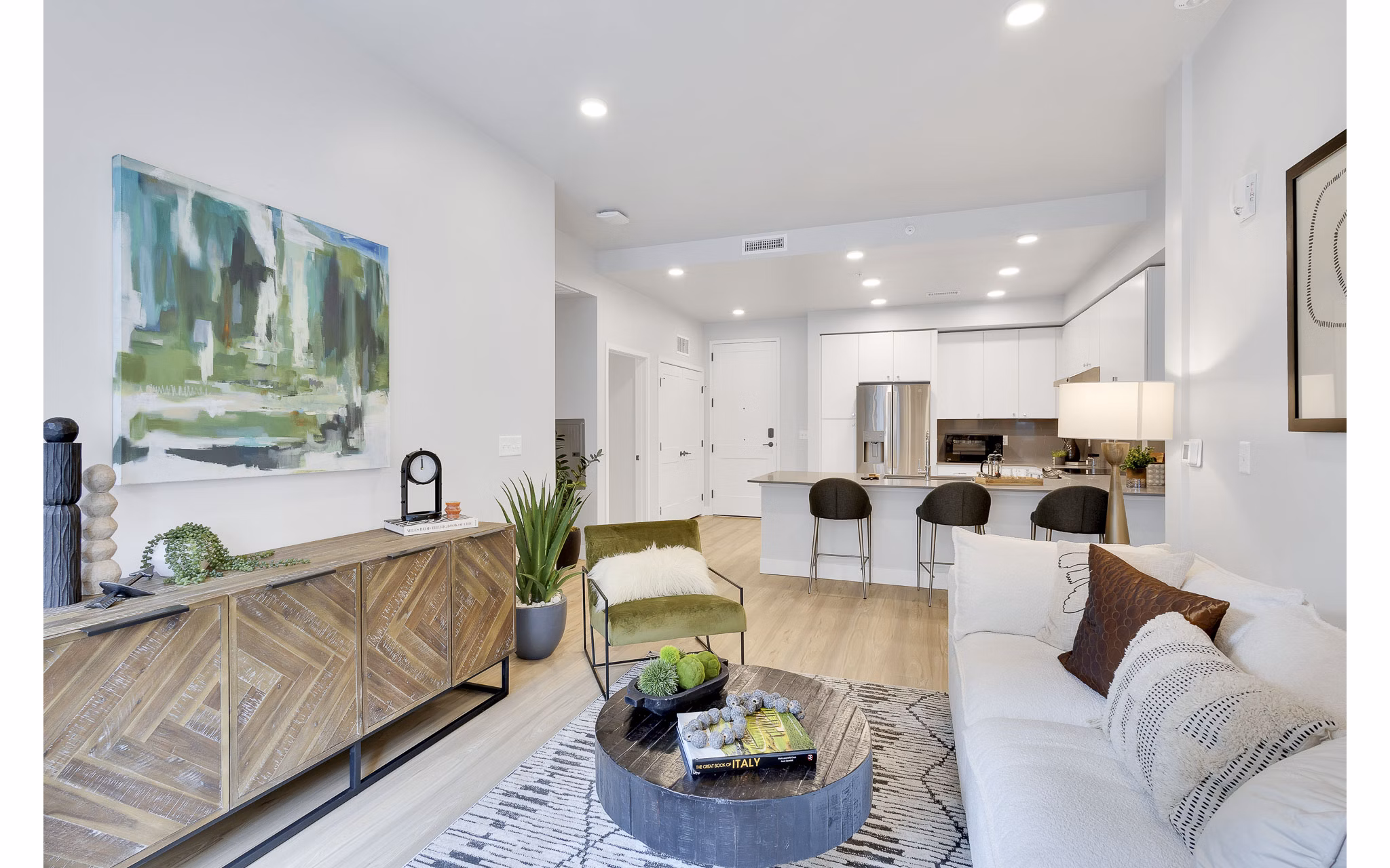 Clubhouse featuring modern design and cozy seating at The Dorsey Apartments, luxury living by Greystar