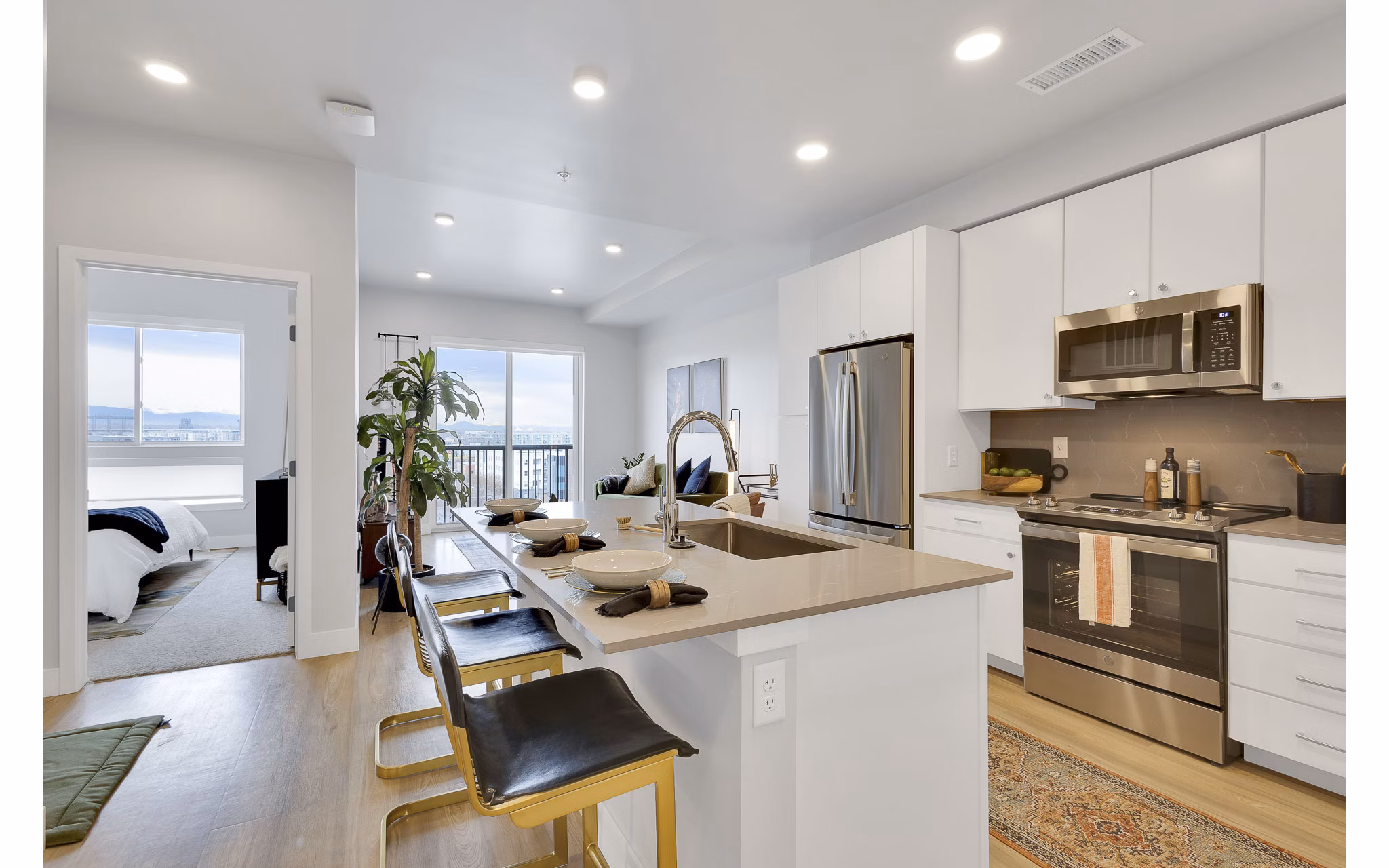 Modern kitchen with stainless steel appliances at The Dorsey Apartments