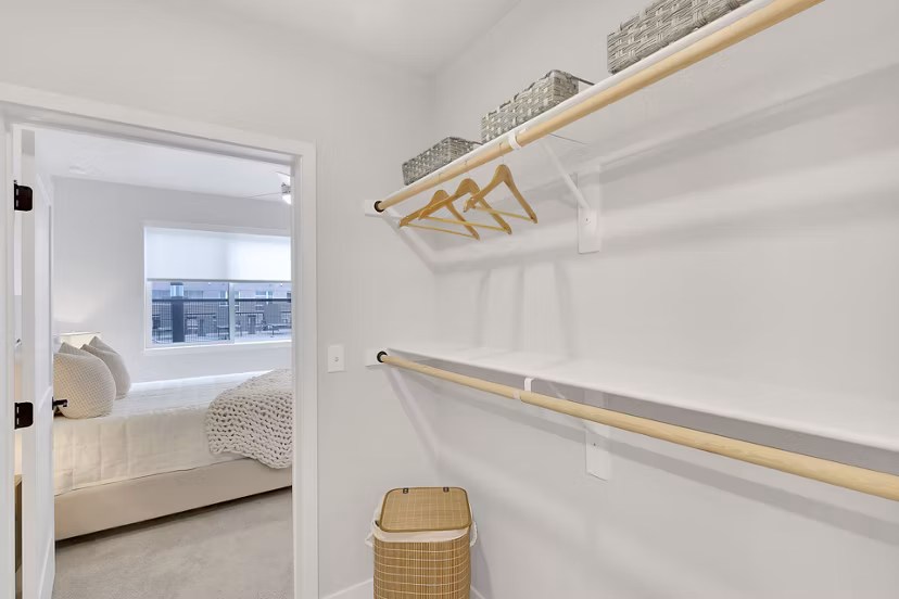Laundry room with modern appliances and ample storage at The Dorsey Apartments, luxury living with convenient amenities