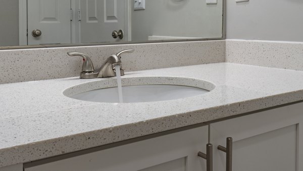 Modern bathroom with sleek fixtures at The Slate Apartments