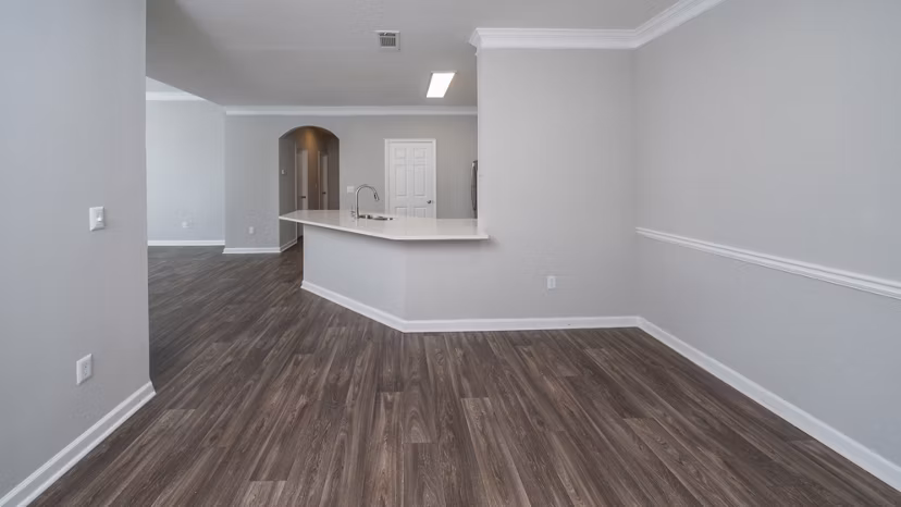Dining area with stylish decor and modern lighting at The Slate Apartments, luxury living by Greystar in a prime location