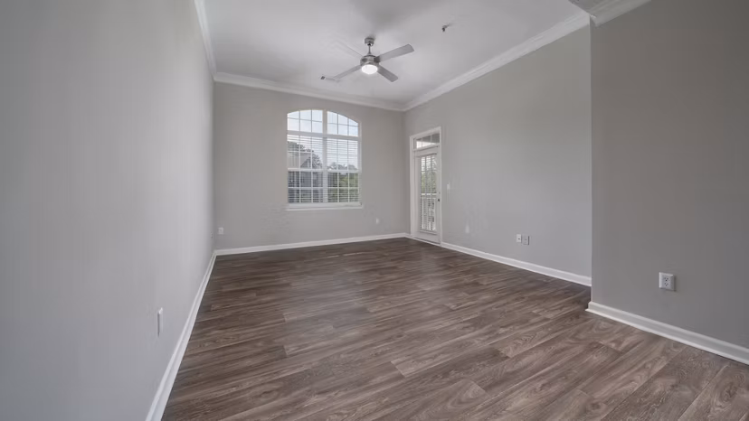 Spacious living room with modern decor at The Slate Apartments, Greystar luxury apartments