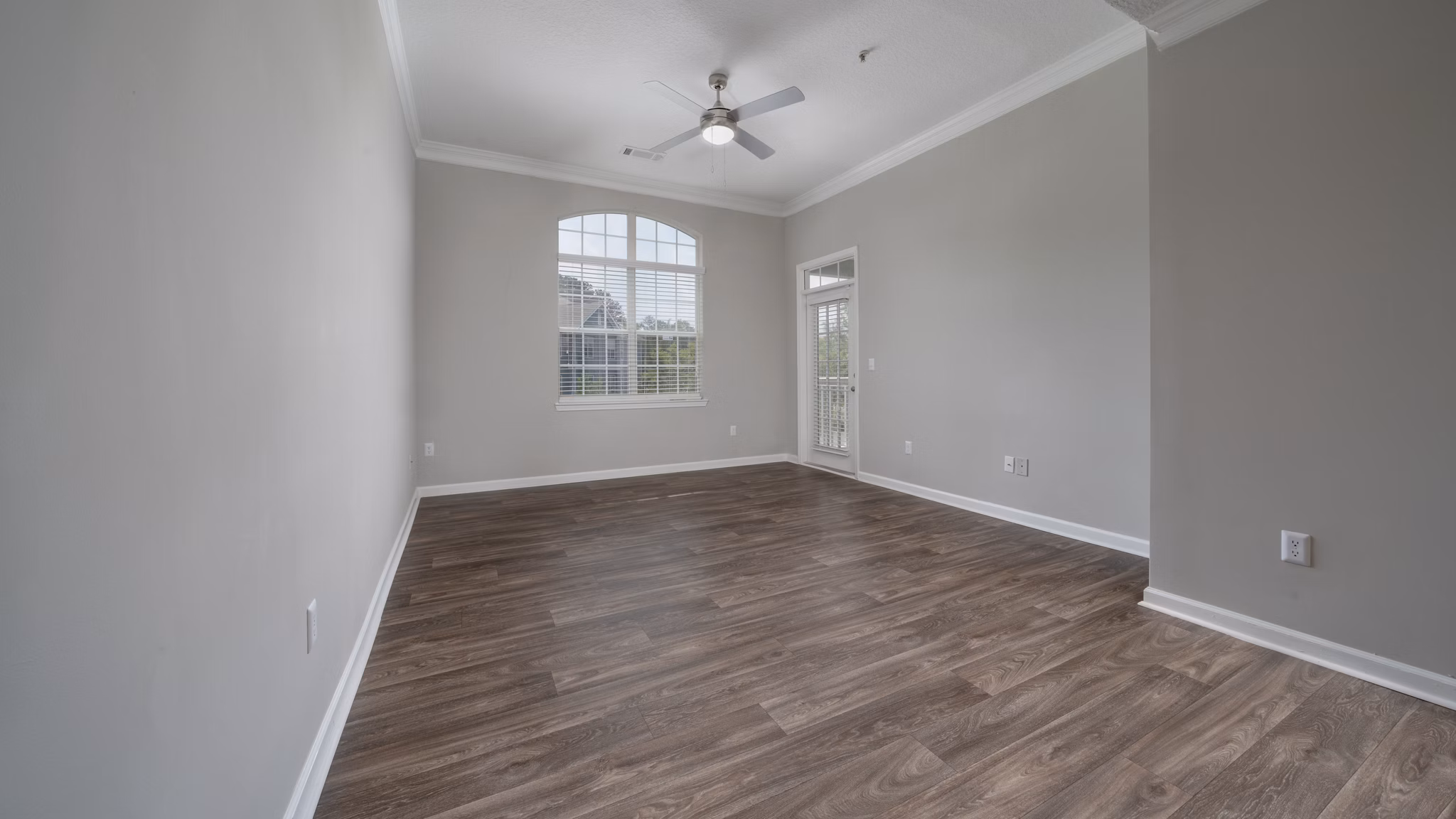Spacious living room with modern decor at The Slate Apartments, Greystar luxury apartments