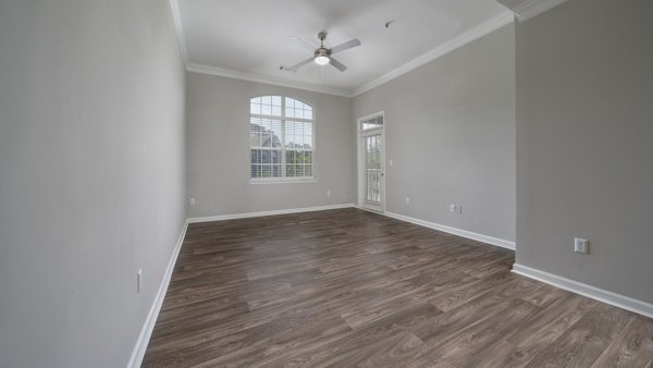 Spacious living room with modern decor at The Slate Apartments, Greystar luxury apartments
