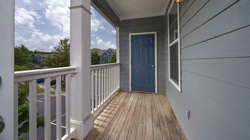 Cozy outdoor patio with stylish seating at The Slate Apartments