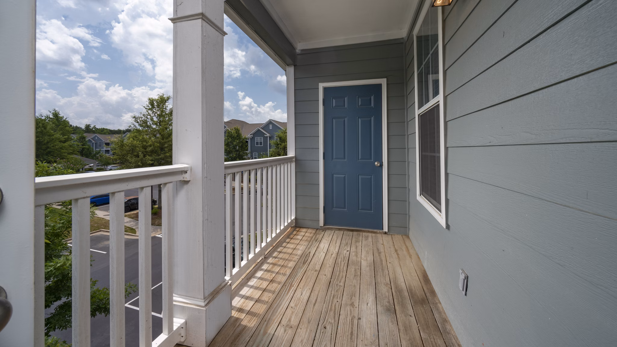 Cozy outdoor patio with stylish seating at The Slate Apartments