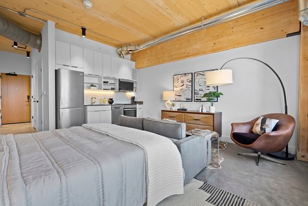 Spacious bedroom with contemporary design at Ann Street Lofts Apartments