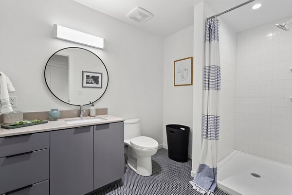 Elegant bathroom with modern fixtures at Ann Street Lofts Apartments