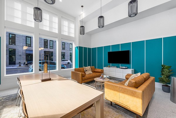Modern clubhouse with stylish seating and social spaces at Ann Street Lofts Apartments