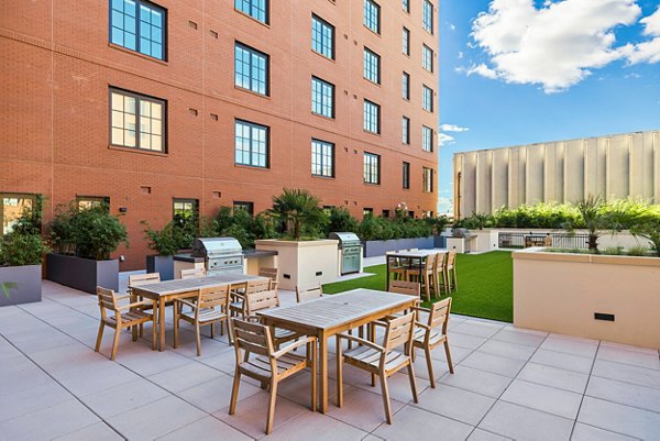 Stylish outdoor patio with seating at Ann Street Lofts Apartments