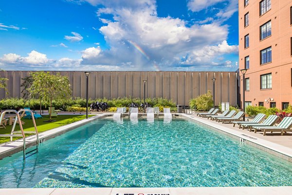 Rooftop infinity pool at Ann Street Lofts Apartments offering luxury urban relaxation