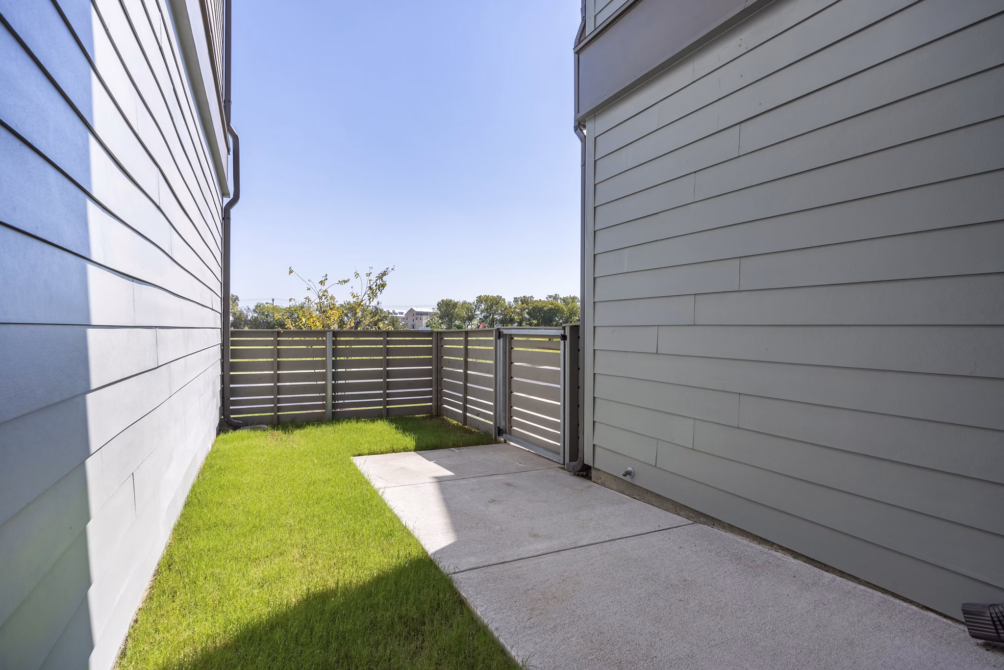 Cozy patio with modern furniture at Escalon Townhomes Apartments, perfect for outdoor relaxation and leisure activities